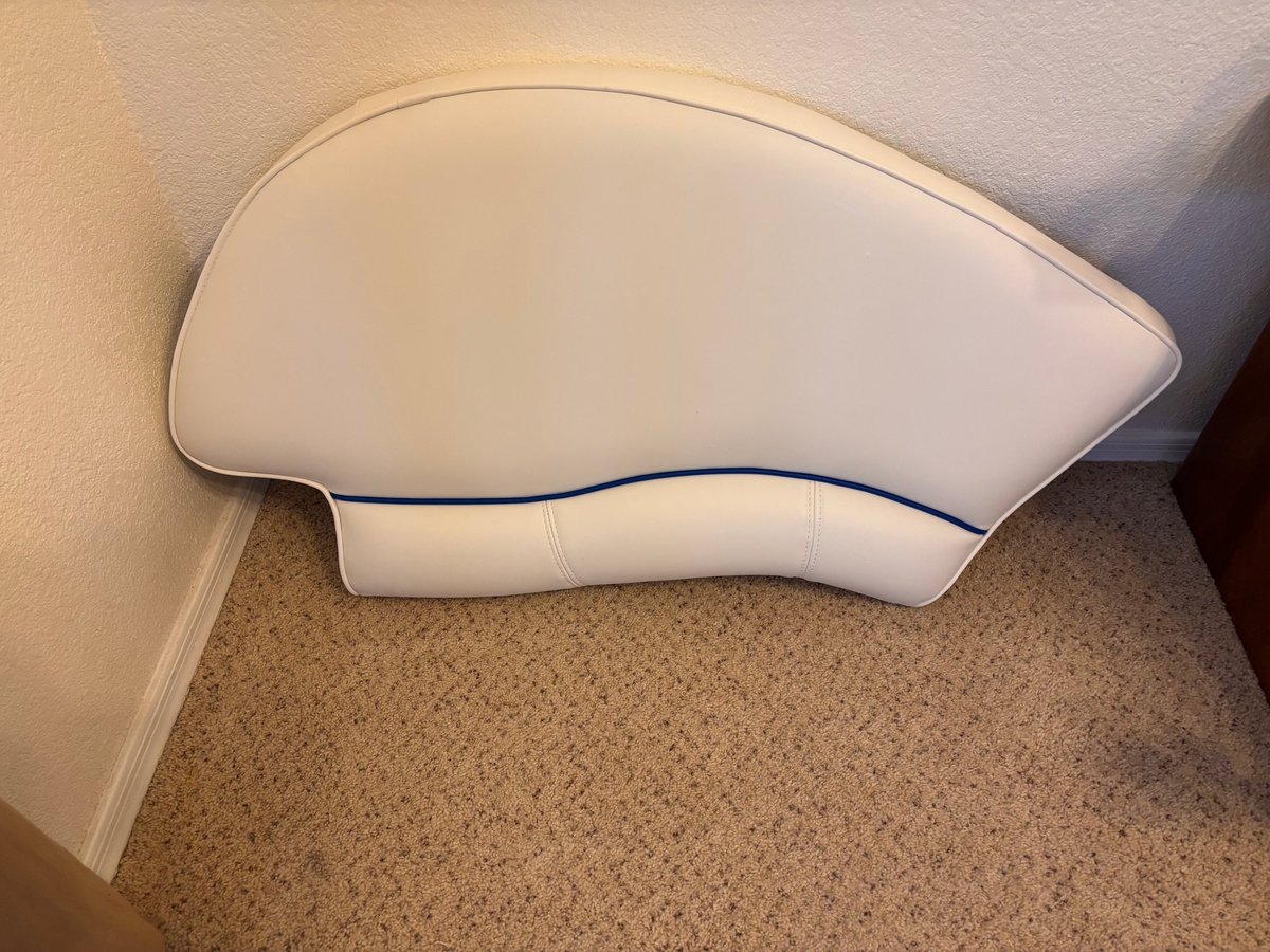 After: Sport boat side bench cushion reupholstered in white Sailrite EverSoft marine vinyl with dark trim